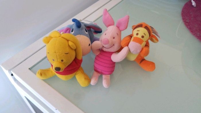 4 peluches grelot winnie l'ourson à accrocher