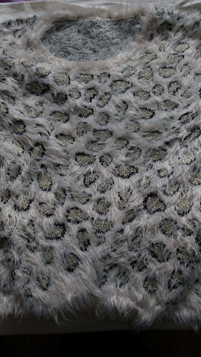 Pull duveteux léopard