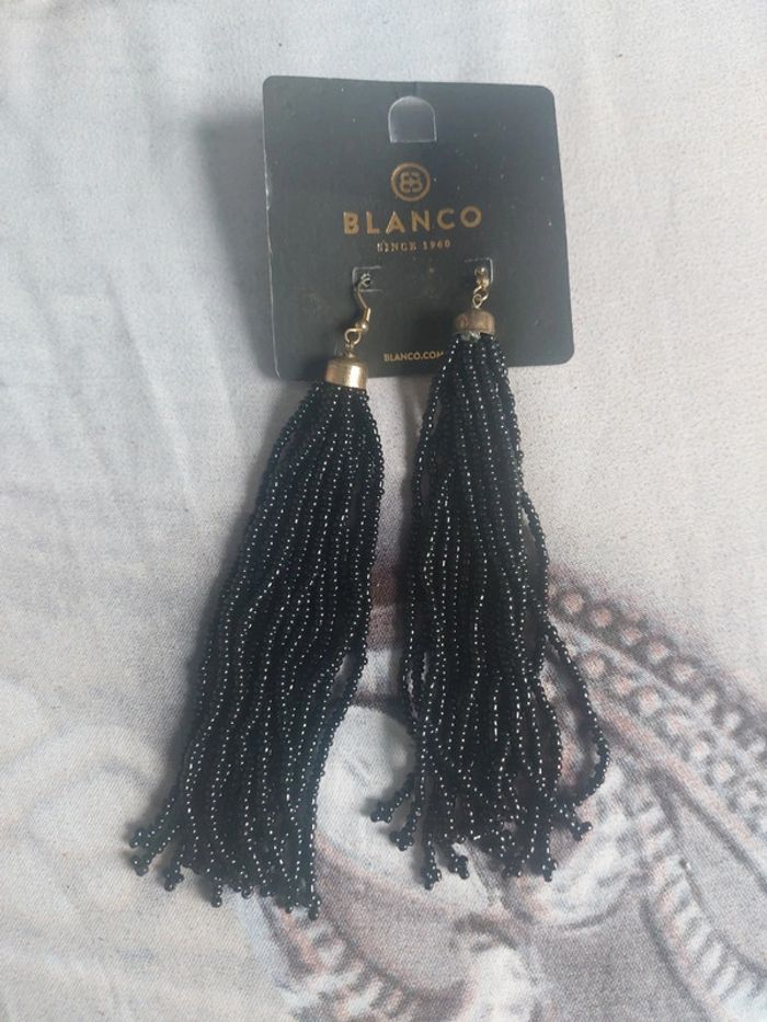 Boucle d'oreille blanco