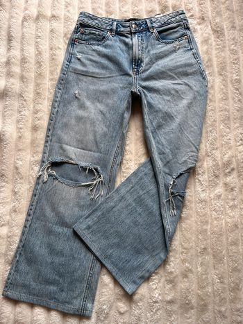 Jean troué bleu Stradivarius 38