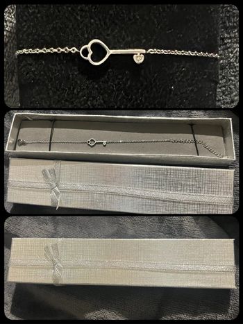 Bracelet clé acier inoxydable argenté neuf dans sa boîte cadeaux