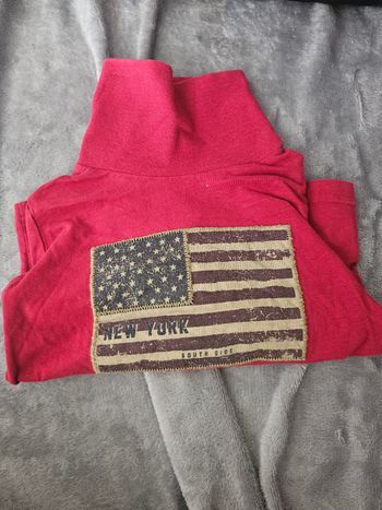 Pull col roulé