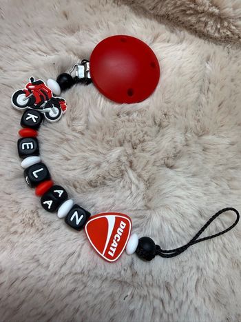 Attache tétine Ducati moto