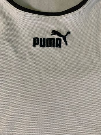 T-shirt puma taille 12 ans.