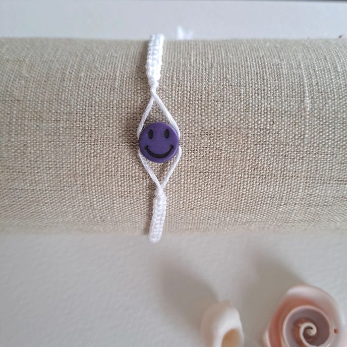 (Réduction) Bracelet blanc avec perle violette - photo numéro 2