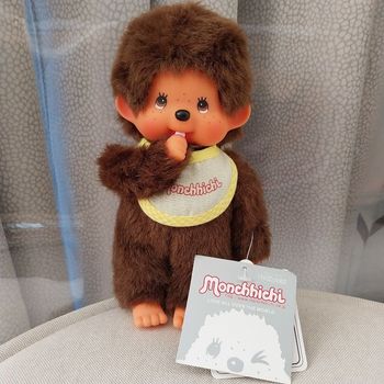 Kiki Monchhichi 20 cm bavoir jaune