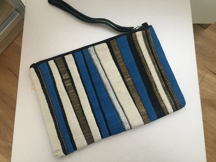 Pochette en cuir doré bleu beige Zign