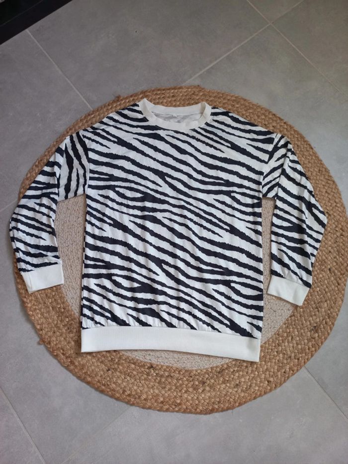 Haut à motifs taille M