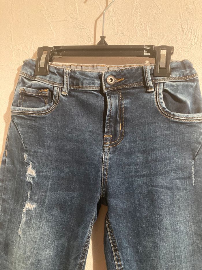 jean bleu déchiré - photo numéro 5