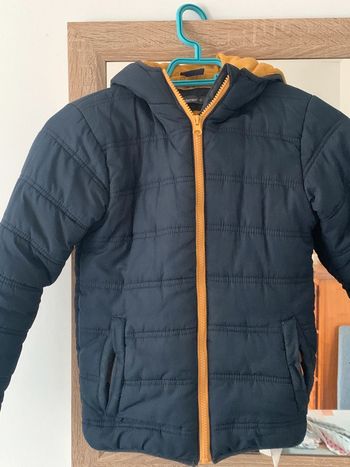 Blouson bleu/jaune 10 ans
