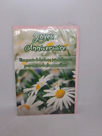 Carte postale avec son enveloppe.
11,5x17cm.
NEUVE. Jouex anniversaire fleurs