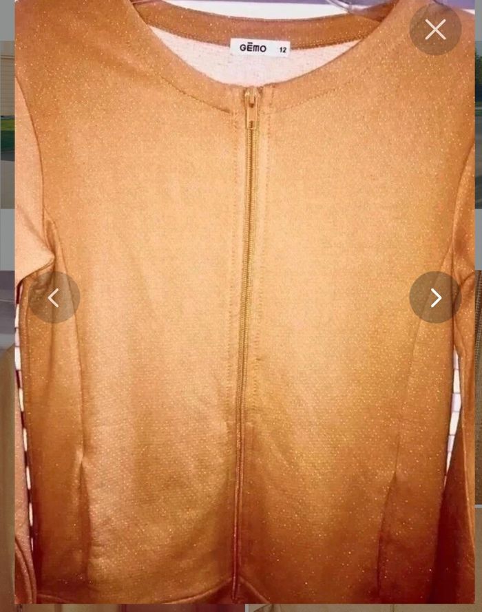 Veste moutarde avec motifs argentés ,intérieur molletonné,poches sur les côtés taille 12 ans de Gemo neuve à 8 euros - photo numéro 3