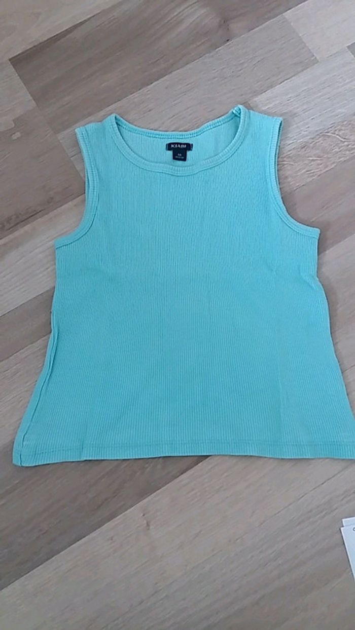 Tee shirt sans manches