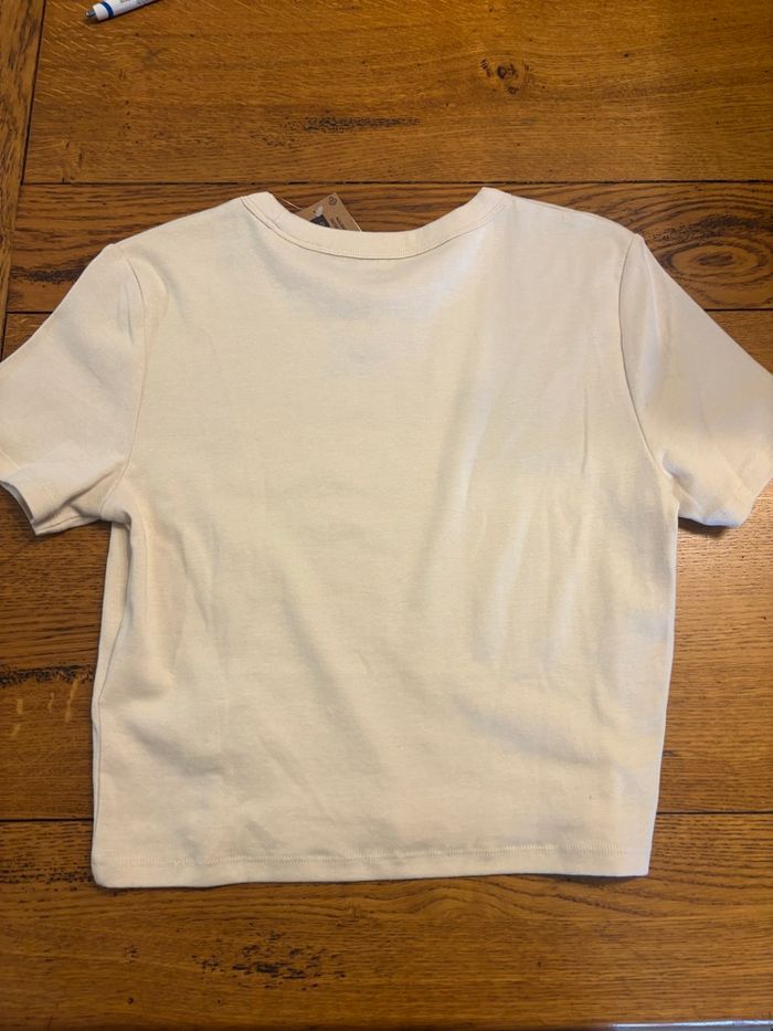 T-shirt blanc à motifs neuf avec étiquette taille M - photo numéro 3