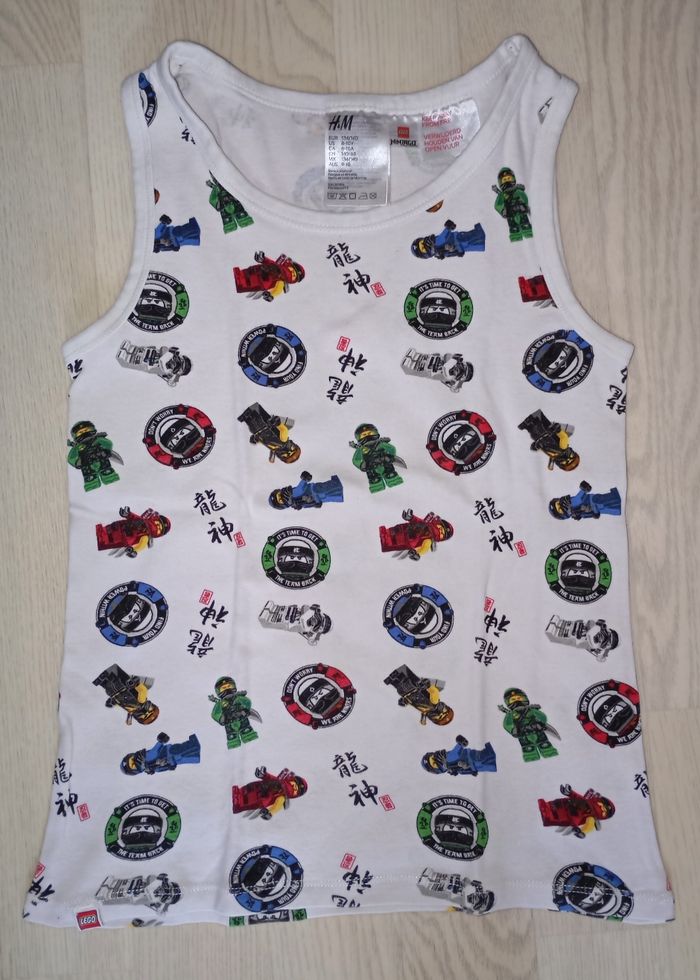 Débardeur blanc motif Ninjago H&M 
T. 134-140 cm