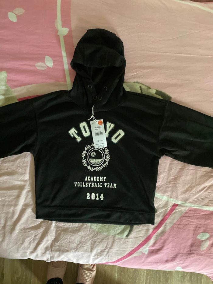 Haut à capuche taille 9/10 ans neuf