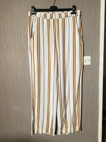 Pantalon jambes larges fin