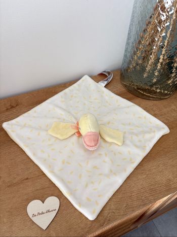 Doudou canard plume noeud satin jaune blanc