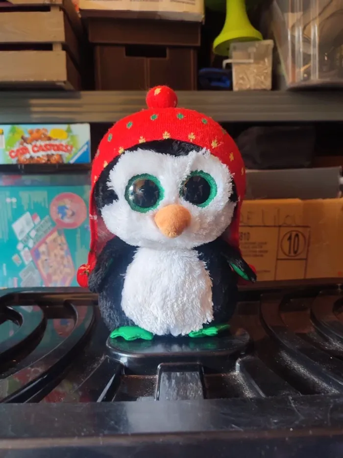 Peluche gros yeux pingouin