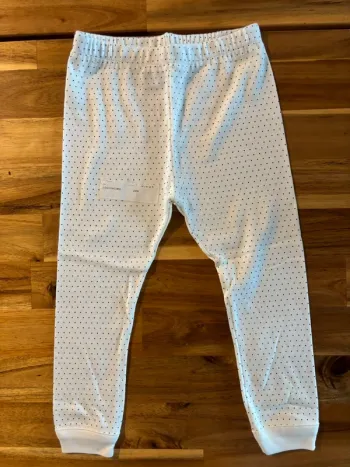 Legging blanc à pois noir