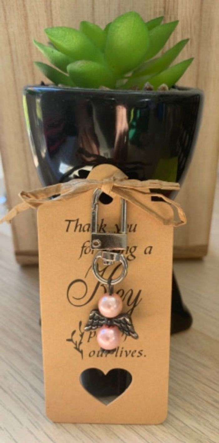 Porte-clés bijou de sacs ange avec perles roses