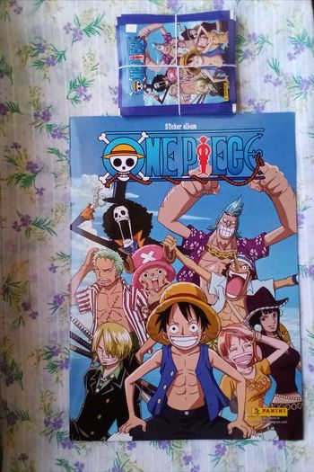Lot Panini ONE PIECE 2021  Un album vide et 16 pochettes scellées