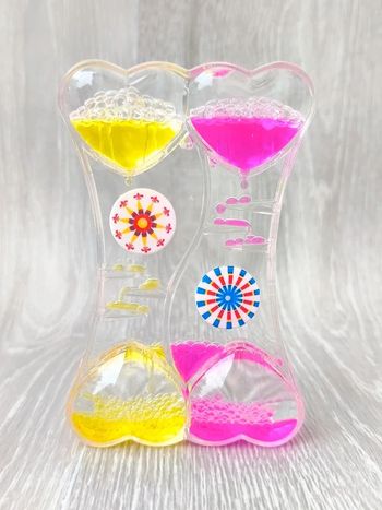 Sablier à huile double apaisant rose / jaune