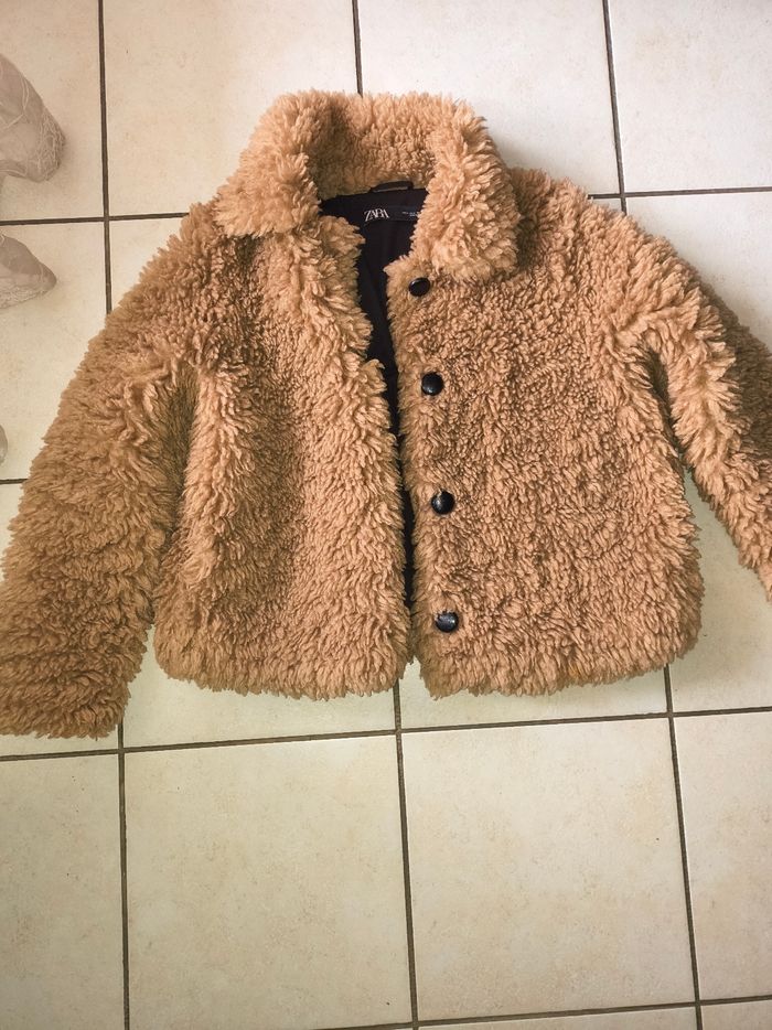 Manteau fausse fourrure