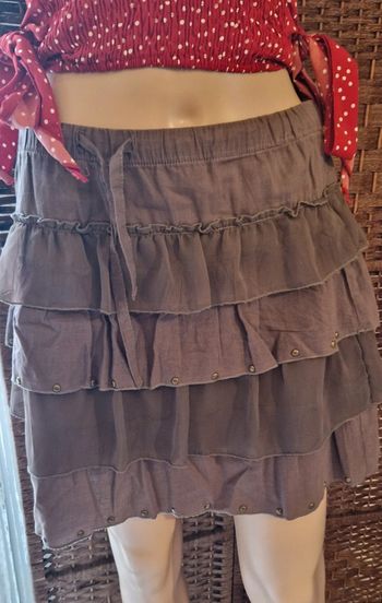 Jupe avec petits clous sur franges taille38