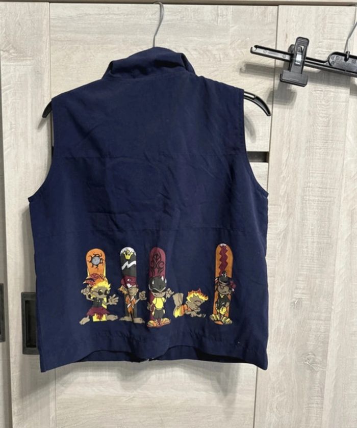 Veste sans manches taille 8 ans