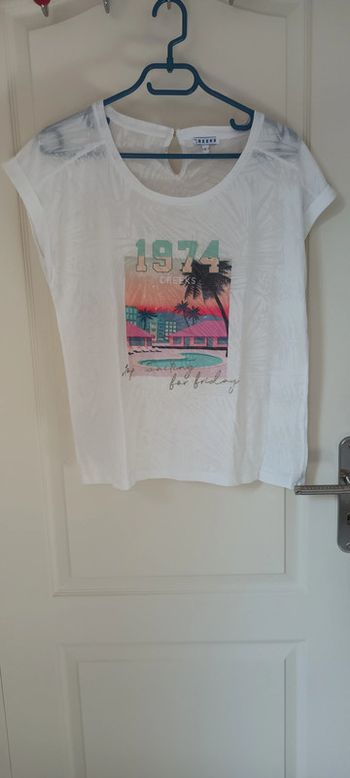 T-shirt blanc avec motif plage