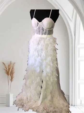 🌼Robe de mariée à plumes🌼
