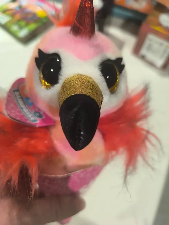 Peluche coco surprise neuve
