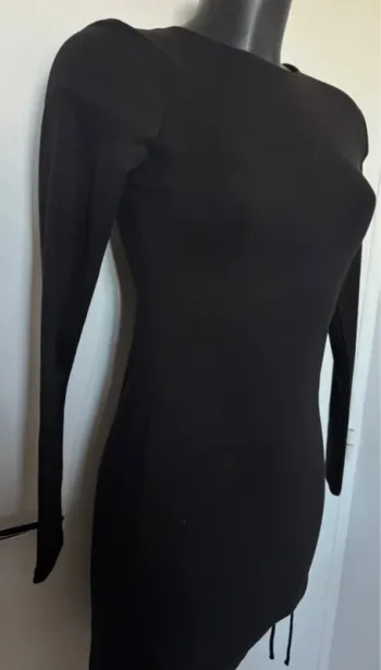 Robe noire sexy moulante neuve 38