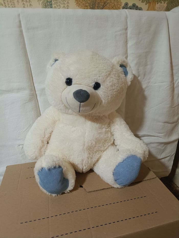 Peluche ours blanc