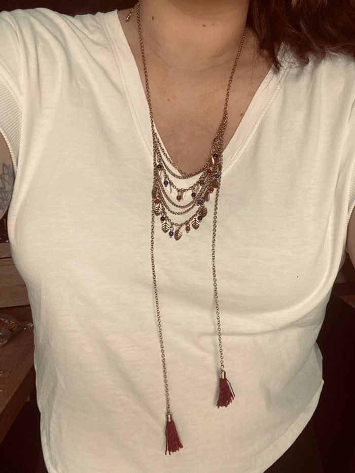 Long collier doré avec chaînes et pompons Promod très bon état