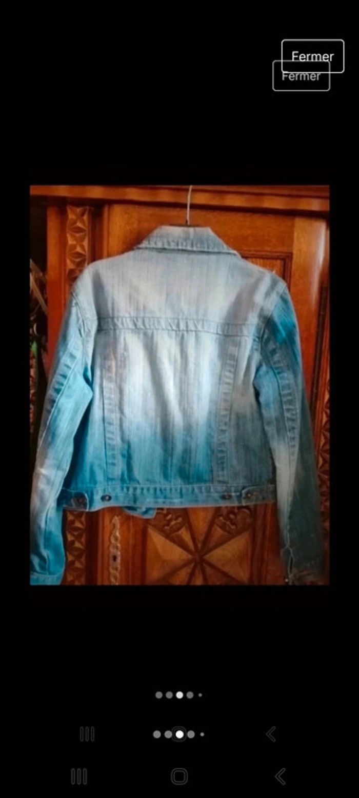 Veste en jean effet usé avec strass - photo numéro 3