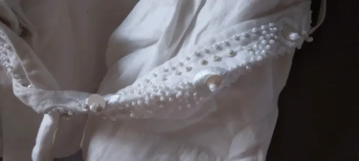 Veste blanche - photo numéro 2