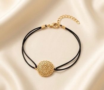 Bracelet noir et doré élégant Neuf