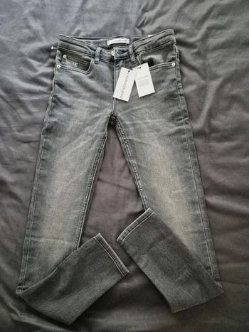 Jeans noir/gris calvin Klein 14 ans neuf