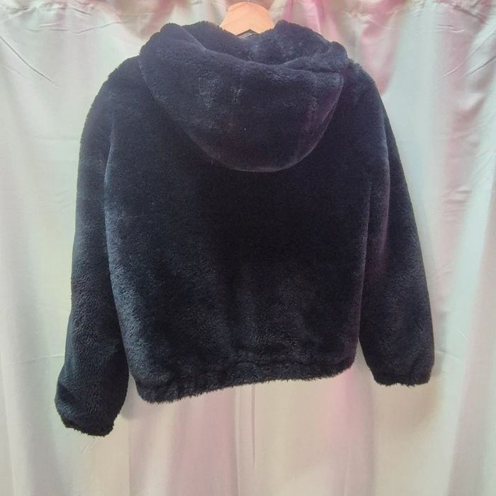 Manteau fausse fourrure