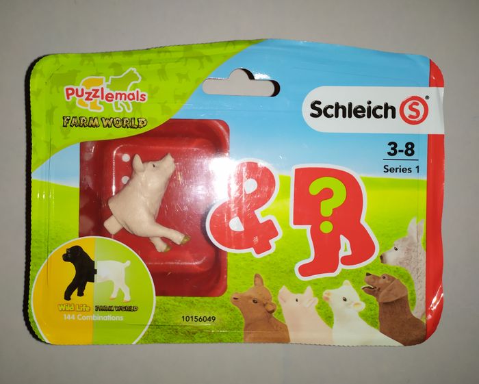 Figurine Schleich series 1 Puzzlemals Farmworld cochon et surprise? neuf boîte