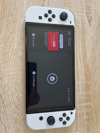 Nintendo Switch Modèle OLED HEG-001 Console Portable - 64Go - Blanc