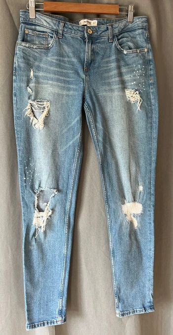 Jean femme troués mango en très bon état taille 40