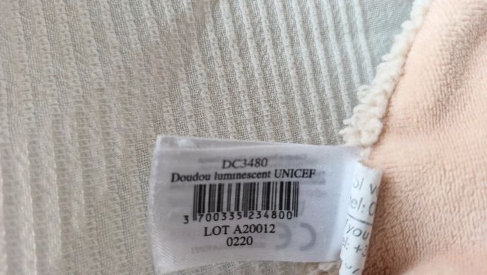 Doudou plat unicef beige et blanc - photo numéro 7
