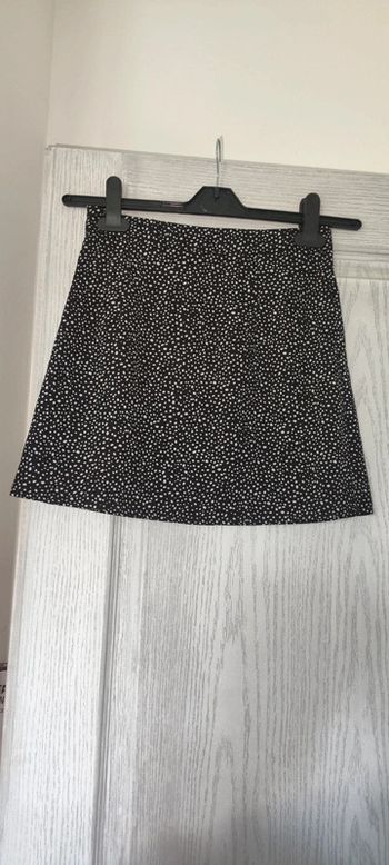 jupe noir à poids blancs