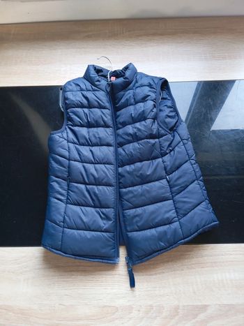 Blouse sans manche 10 ans très bon état