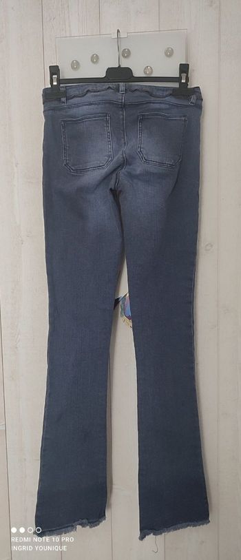 Jeans droit bleu avec détails fermeture à la taille taille 34