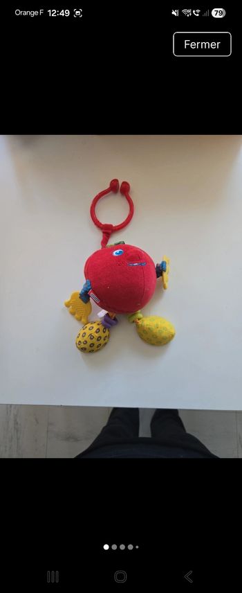 Attache poussette jouet