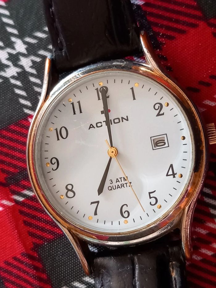 Montre ancienne - Action